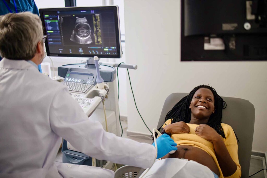 Pregnant woman having ultrasound